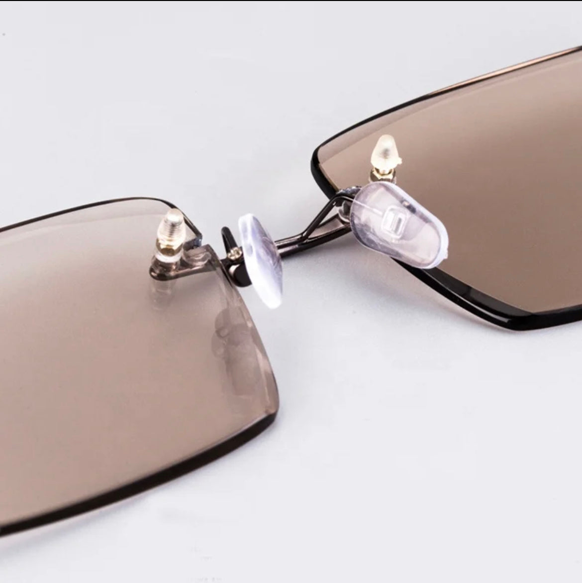 Light brown Crystal in gun Metal
